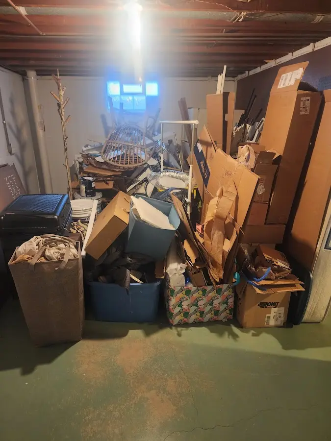 Roll-off dumpster container at job site for 2 Yard Dumpster Rental in Sunset Beach